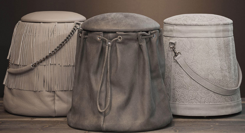 SMART STOOLS – Unique looking leather pouffes that double up as magazine holders too. By Gamma.