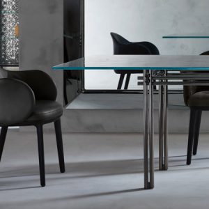 OSCAR CHAIR – Sophisticated dining chair with solid wood structure and leather or unbuckle seat and backrest. By Fiam Italia.