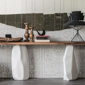 RAPA NUI CONSOLE – A unique and elegant wooden console table, made of solid wood for the top and two monoliths for the base, a must have statement piece for any entryway. By Cattelan Italia.