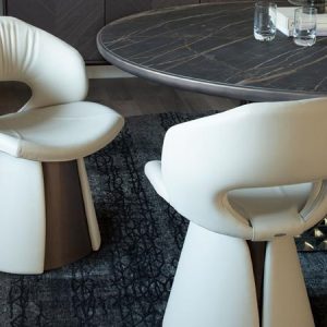 DAFNE CHAIR – Unique and distinctive contemporary chair, featuring a cone-shaped based and body, available in fabric or leather. By Cattelan Italia.